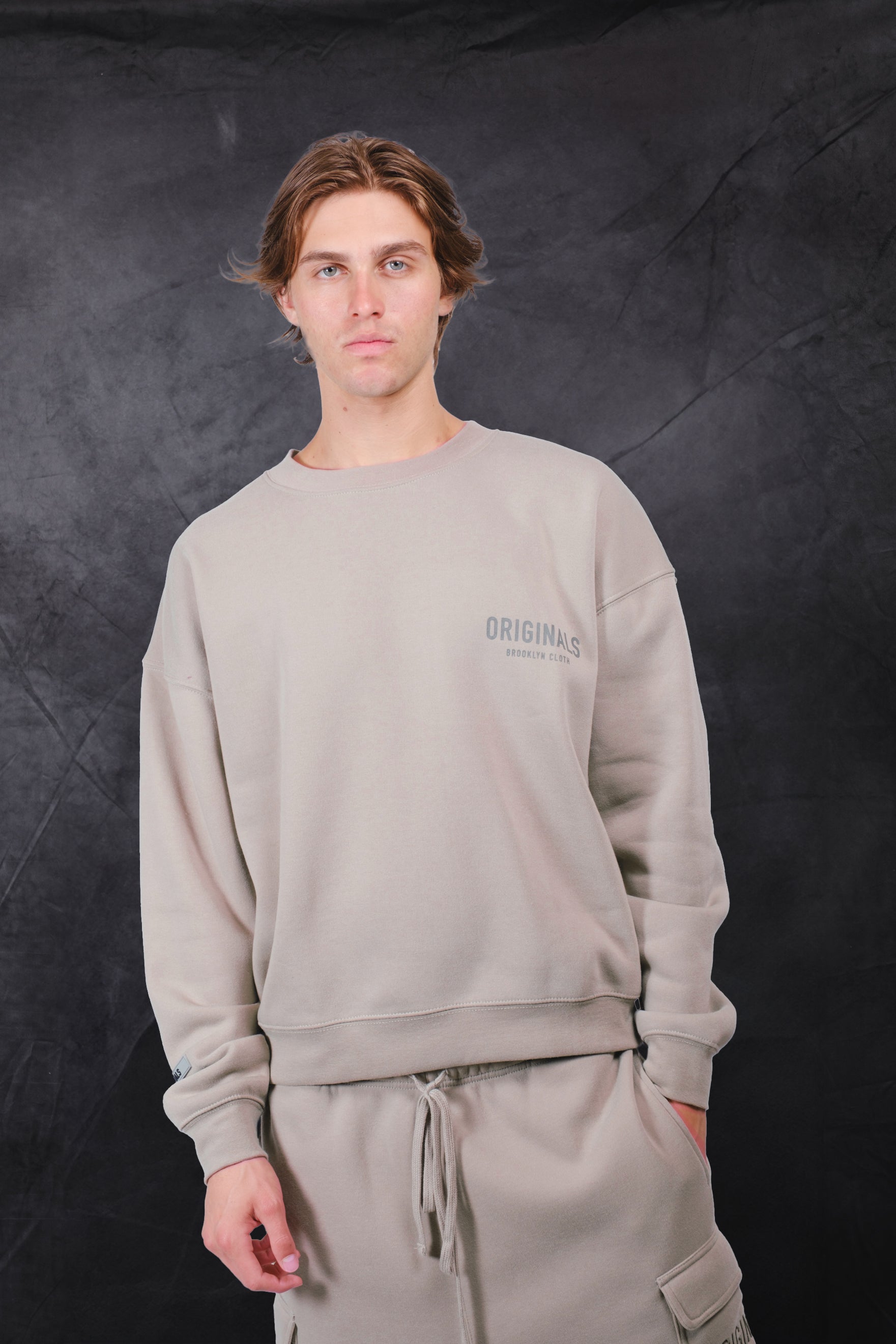 Stylish Originals Tonal Hd Fleece Crew with textured chest logo
#color_pumice-stone