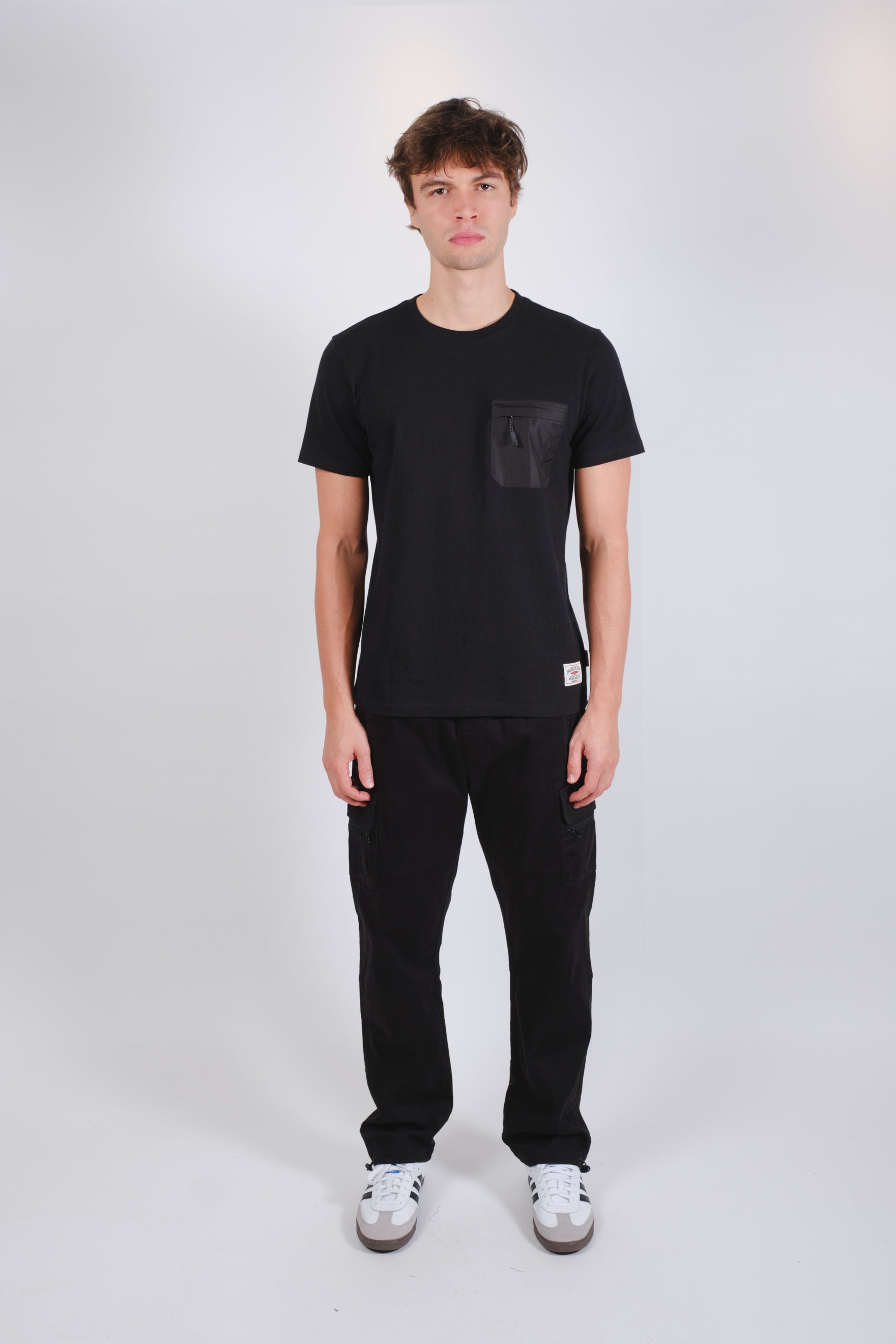 Men’s casual nylon tee with front zip pocket detail
#color_black