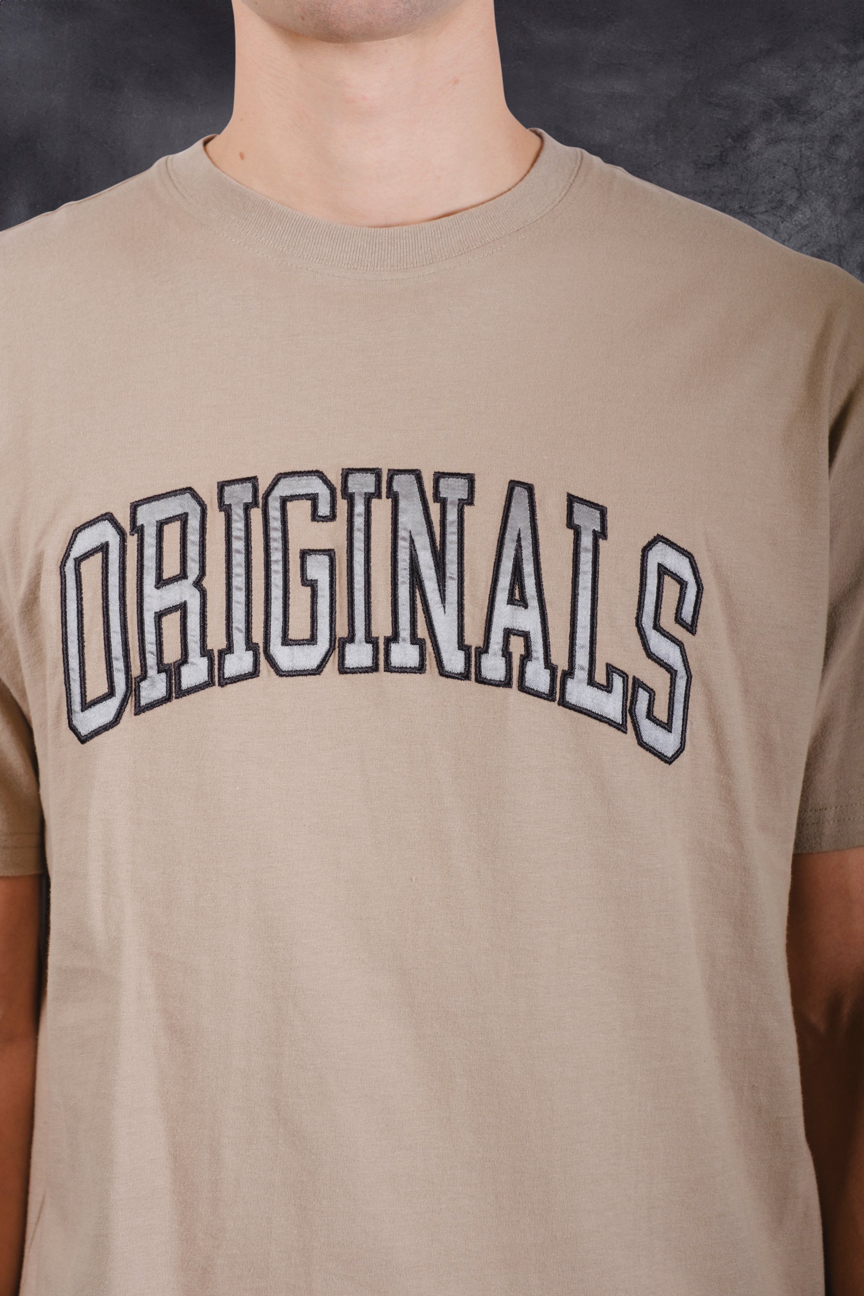 Men’s cotton Originals Tee featuring satin applique branding
#color_pumice stone